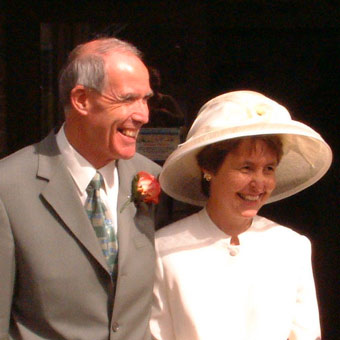 Leaving the church - has John changes his suit?