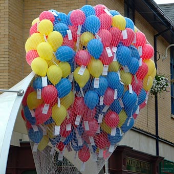 Helium-filled ballons set off by IMC