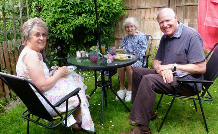Liz, Dorothy and John in Dorothy's back garden
