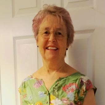 Liz tries on a new dress