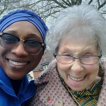 Dorothy and one of her Carers