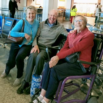 June is ready to go home: at Heathrow Airport